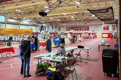 Voting takes place at the Hawkes Field House at Reading Memorial High School.