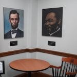 Dr. Martin Luther King, Jr and Abraham Lincoln in the Select Board meeting room at town hall.