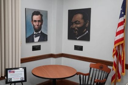 Dr. Martin Luther King, Jr and Abraham Lincoln in the Select Board meeting room at town hall.