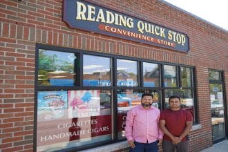 Reading Quick Stop's new owners Mohammad Kamal (left) and Zahidul Islam (right).